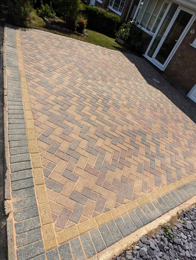 Block paving driveway cleaning before photo