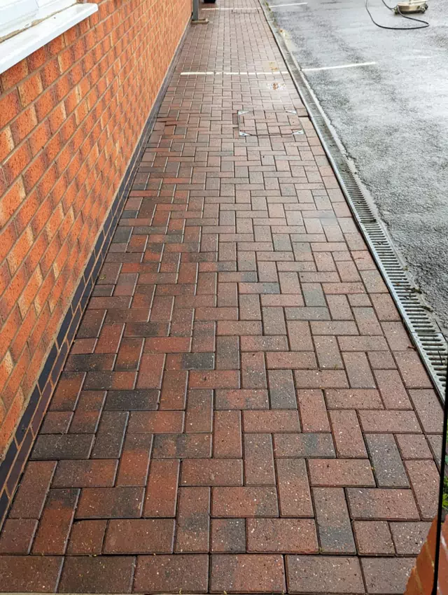 Pressure washing block paving pathway after photo