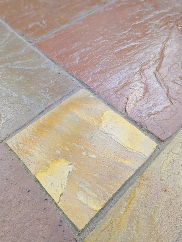 Pressure washing slab patio after photo
